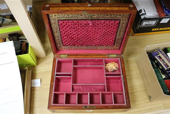 A burr walnut and mother of pearl inlaid sewing box